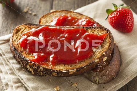 Homemade Strawberry Jelly on Toast Stock Photos