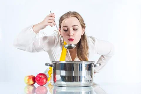 Homemaker with ladle Stock Photos