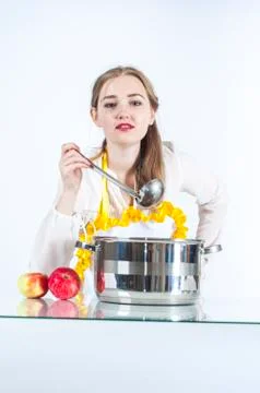 Homemaker with ladle Stock Photos