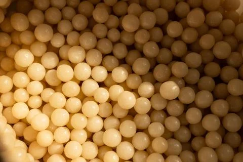 Homeopathic balls on the surface. Stock Photos