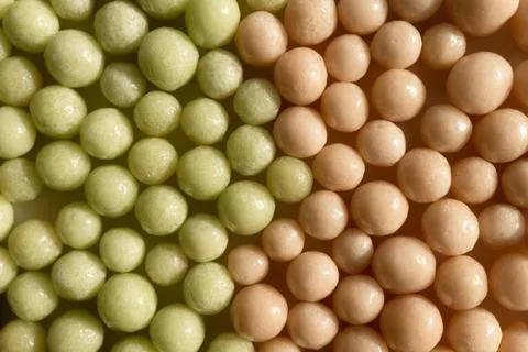 Homeopathic balls on the surface. Stock Photos