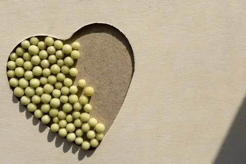 Homeopathic balls on the surface. Stock Photos
