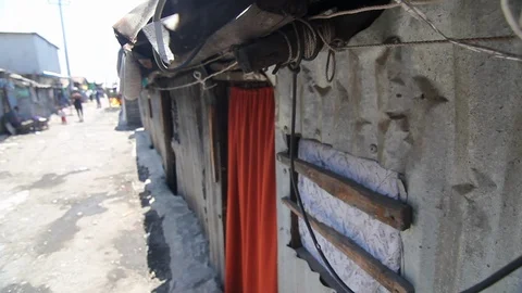 Homes in African Slum Looking Down Road as Curtain Blows in Wind 스톡 동영상 102149408