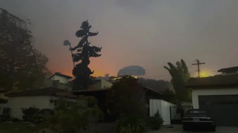 Homes in danger, Strong wind spreading fires in Pacific Palisades, Los Angeles Stock Footage 301846824