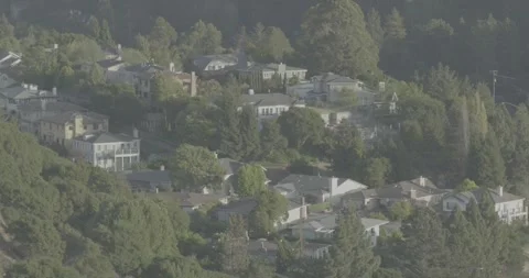 Homes on a mountain side Stock Footage 324289324
