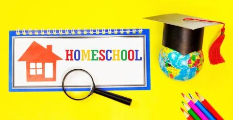 Homeschool-text label in the student's notebook. Stock Photos