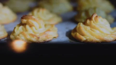 Homestyle plated presentation: baking duchess potatoes until golden Stock Footage 342196498