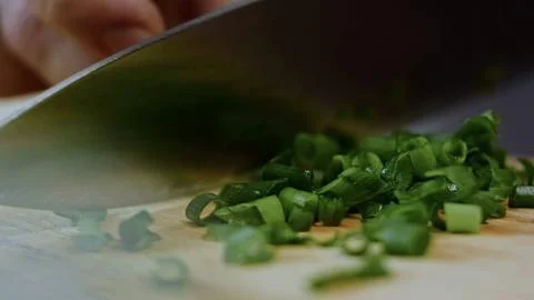 Homestyle plating process view: cracking eggs into the tomato mixture 스톡 사진
