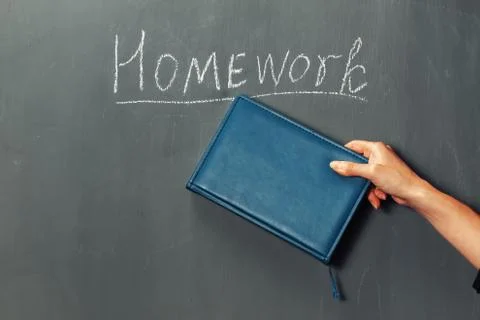 Homework on a blackboard Stock Photos
