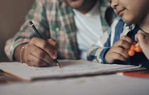 Homework, hands or parent with son for help, teaching subject or study supp.. Stock Photos