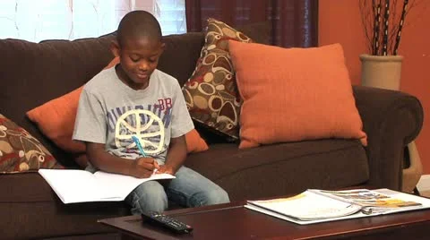 Homework on the Sofa by Eva-Lution Studios - 588 Video stock 12340788