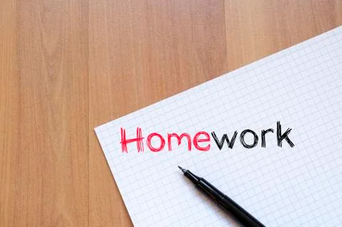 Homework text concept on notebook Stock Photos