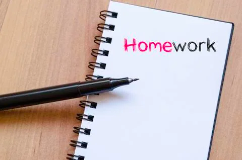 Homework text concept on notebook Stock Photos