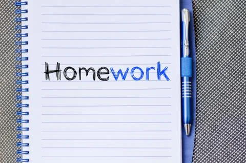 Homework text concept on notebook Stock Photos