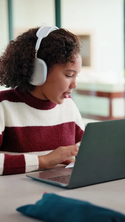 Homework, video call and child on laptop in home for online lesson, elearning Stock Footage 335848605