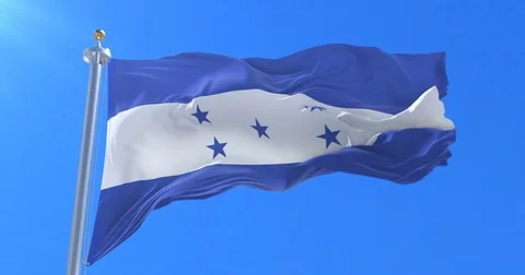 Honduran flag waving at wind with blue sky in slow, loop Vídeos de archivo 81876341