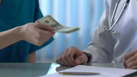 Honest doctor refusing take bribe money, shadow medical business, illegal deal Stock Footage 90917738