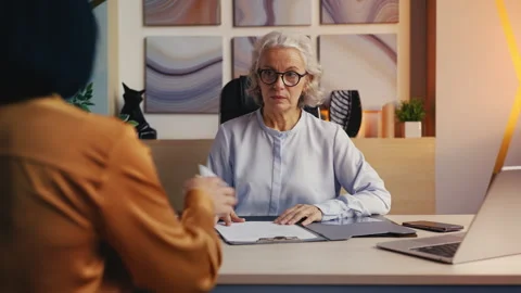 Honest woman official refusing to take bribe from female visitor at office Stock Footage 318011404