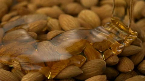 Honey on almond, Slow Motion Stock Footage
