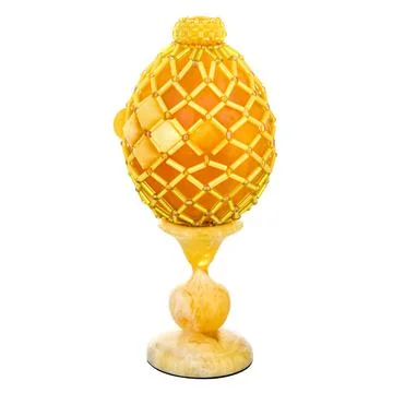 Honey Amber Easter Egg on a stand Stock Photos