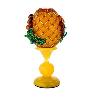 Honey Amber Easter Egg on a stand Stock Photos