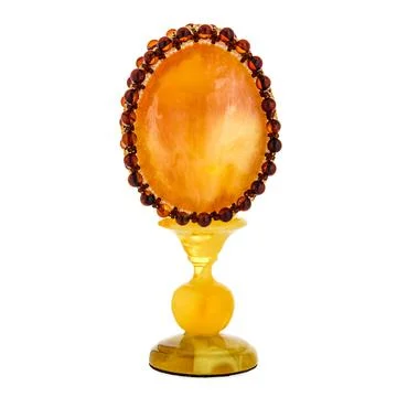 Honey Amber Easter Egg on a stand Stock-Fotos
