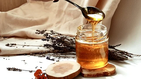 Honey and lavender Stock Footage 128703363