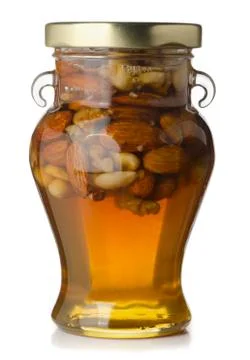 Honey and nuts Stock-Fotos