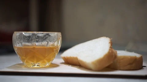 Honey and pieces of bread Stock Footage 103221700