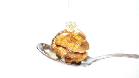 Honey and walnuts on spoon close up Stock Footage 35713755
