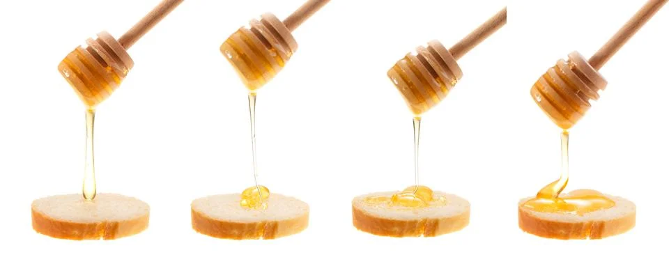 Honey is applied to the surface of bread. Isolated on a white background. Set Stock Photos