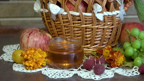 Honey with a basket of fruit Stock Footage 158791531
