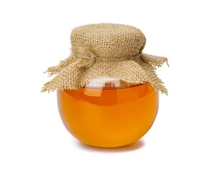 Honey bee in jar isolate on white backgroun, bee products by organic natural  Stock-Fotos