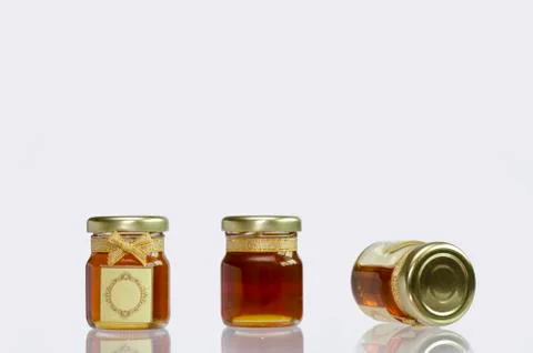 Honey in the bottle 库存照片