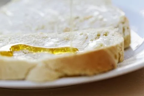 Honey on bread Stock Photos