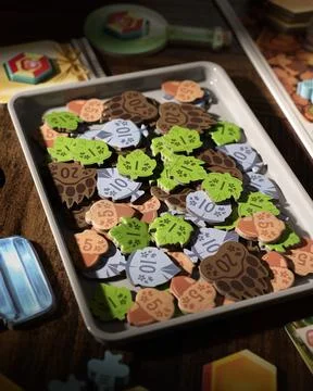 Honey Buzz board game components close up with wooden pieces honeycomb tile.. Foto stock