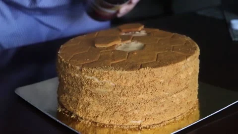 Honey cake is poured with honey. Stock Footage