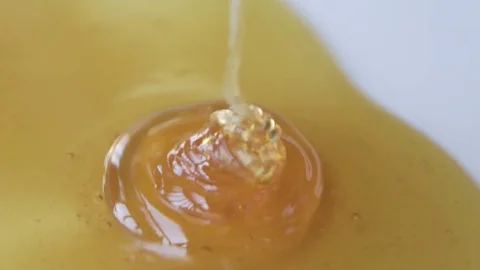 Honey Coil Puring in Slow Motion on Plate Stock Footage 69212489