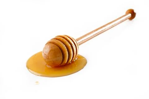 Honey dipper on background Stock Photos