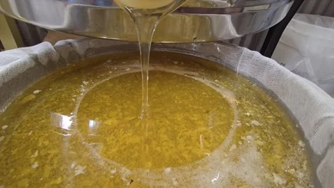 Honey Dripping During Filtration Process Stock Footage 293557146