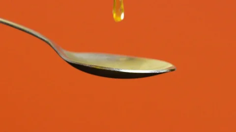 Honey Dripping On Spoon Red 스톡 동영상 87476428