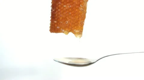Honey drips in a spoon Stock Footage 11701841