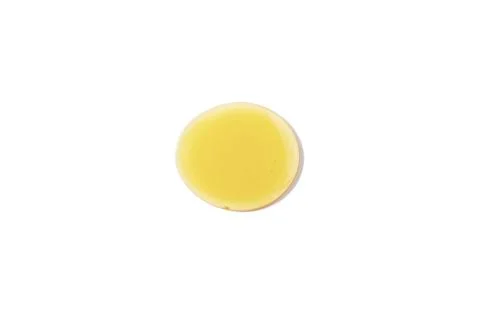 Honey drop isolated on white background. Top view. Stock Photos