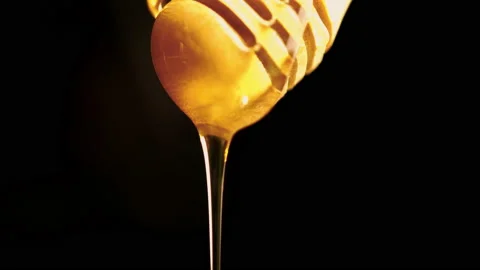 Honey drops end on black background organic food healthy Stock Footage 201521144
