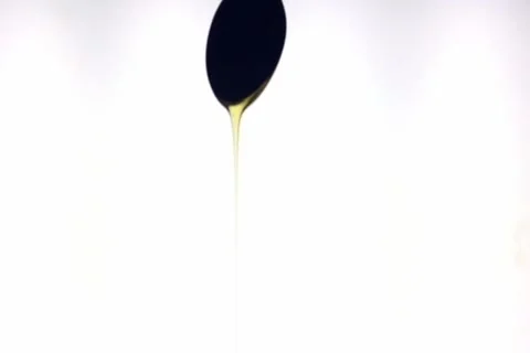 Honey drops from spoon Video stock 930033