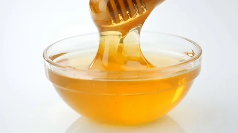 Honey extraction with a dipper in slow motion Video stock 74760360
