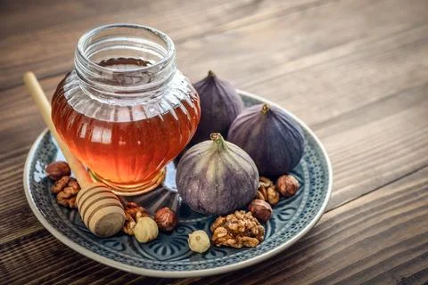 Honey with fresh figs Stock Photos