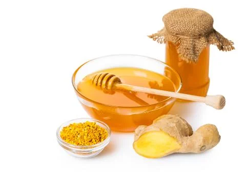 Honey with ginger Stock Photos
