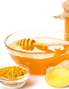 Honey with ginger Stock Photos