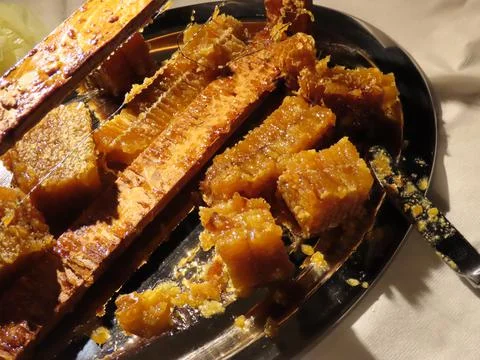 Honey in honeycomb Stock Photos